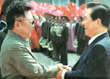 Kim Dae Jung and Kim Jong Il in a historic handshake.